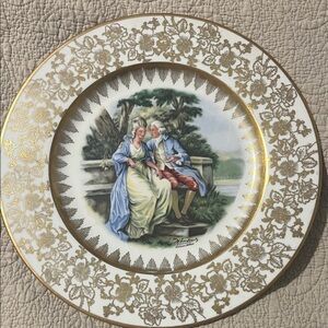 Elegant Gold and White Decorative Plate